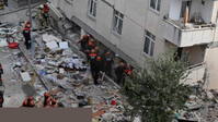 A six-story building partially collapsed in Istanbul, trapping people