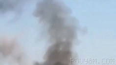Thick smoke is being carried into the air from Erbil, most likely caused by explosions that occurred during demonstrations.
