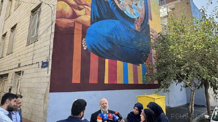 اثر یک هنرمند فلسطینی به شکل دیوارنگاره در تهران رونمایی شد