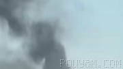 Smoke from the impact of an Iranian ballistic missile near a border crossing in Kuwait