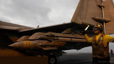 US Navy aircraft take off from the flight deck of the aircraft carrier USS George H. W. Bush (CVN-77)…
