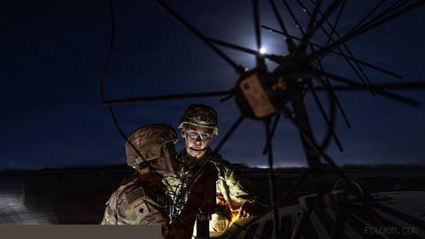 U.S. Army paratroopers installed communications equipment at a remote base in the Middle East