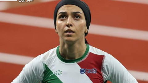 “Farzaneh Fasihi,” an Olympic runner from Iran, says she was threatened after protesting the killing of protesters in Dey 1404, and officials prevented her from competing…