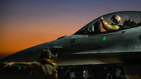 A U.S. Air Force fighter pilot is conducting pre-flight checks on an F-16 fighter. The F-16 is a…
