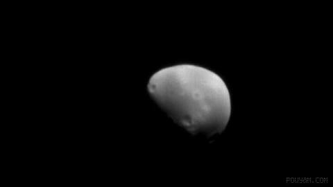 Evidence has been found of a collision between Deimos and a very large asteroid.