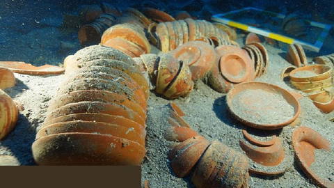 Archaeologists recover thousands of ceramic artifacts from a roughly
